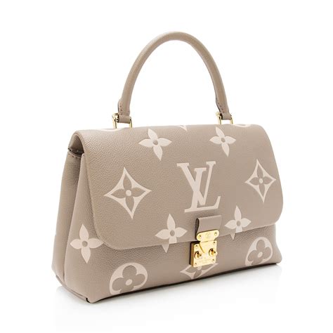 louis vuitton giant monogram empreinte madeleine mm top handle bag|louis vuitton madeleine mm monogram.